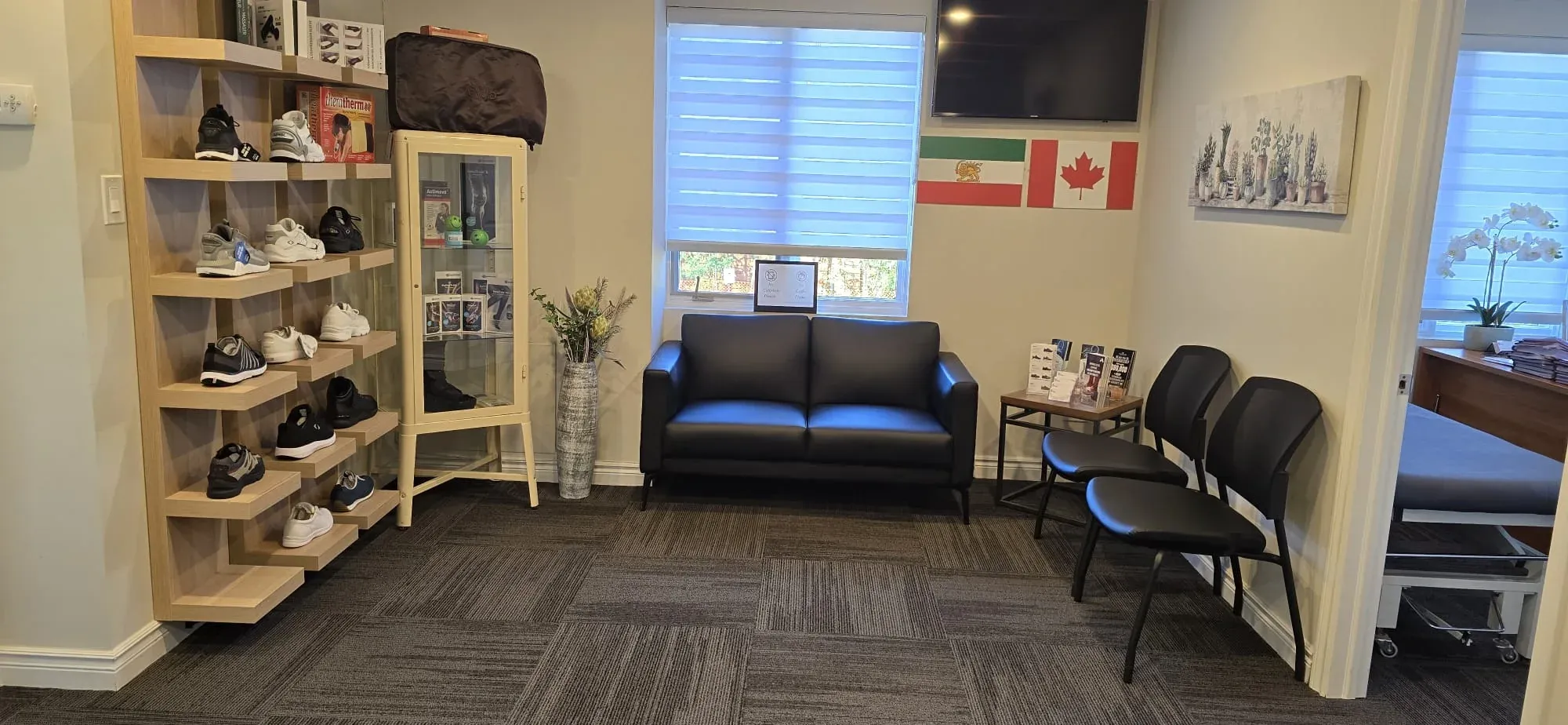 Patient waiting area and orthopedic footwear display at Physiotrust